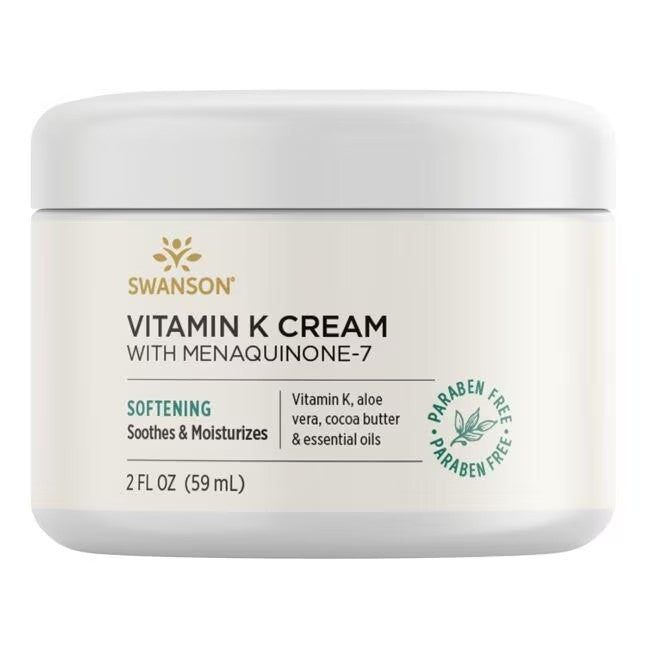 A white plastic jar labeled "Swanson Vitamin K Cream with Menaquinone-7 2 fl oz (59 ml)" featuring claims of softening, soothing, and moisturizing the skin. Contains 2 fl oz (59 mL) and is marked as paraben-free.