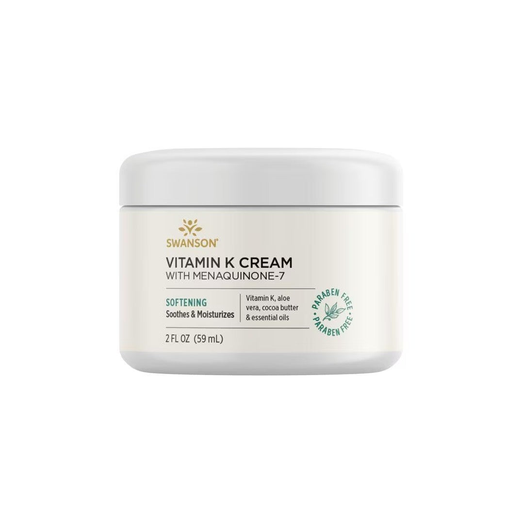 A jar of Swanson Vitamin K Cream with Menaquinone-7 2 fl oz (59 ml), labeled as softening and paraben-free, contains aloe vera, cocoa butter, and essential oils. This Vitamin K Cream with Menaquinone-7 2 fl oz (59 ml) is designed to nourish your skin.