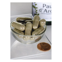 Thumbnail for A Swanson Full Spectrum Pau d'Arco 500 mg bottle is partially visible behind a small glass bowl of greenish-brown capsules next to a penny, indicating the capsules' size and suggesting their antioxidant support for the immune system.