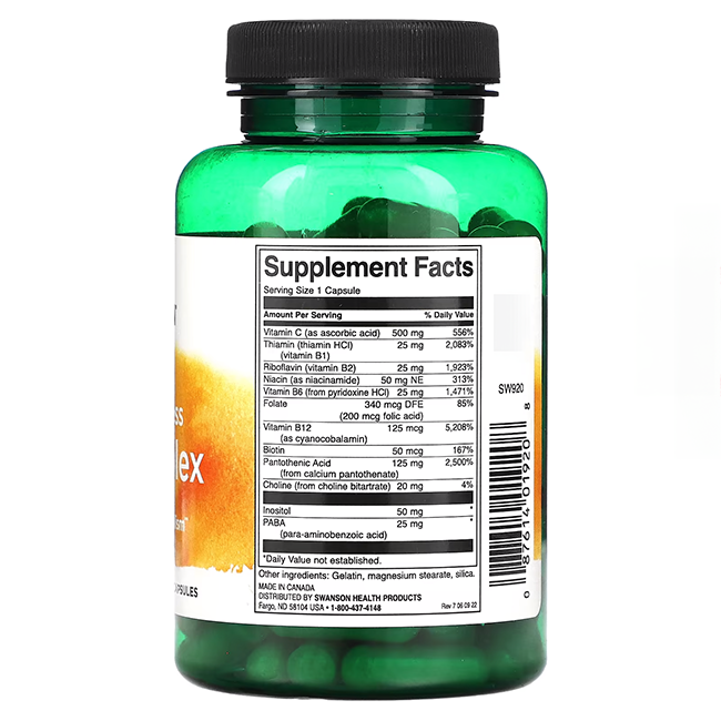 The green bottle of Swanson's B-Complex with Vitamin C - 500 mg (100 capsules) features a visible label showing supplement facts, emphasizing B vitamins for optimal energy production.