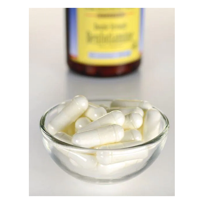 A small glass bowl containing white capsules, intended to support healthy glucose metabolism, is in the foreground, with a blurred Swanson Vitamin B-1 Benfotiamine 160 mg supplement bottle in the background.