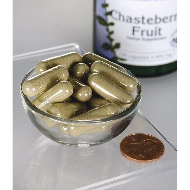 Swanson's Chasteberry Fruit - 400 mg 120 cápsulas en un bol encima de un penique.
