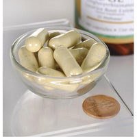 Imagen en miniatura de DGL Deglycyrrhizinated Licorice - 750 mg 90 capsules by Swanson en un cuenco junto a un penique.